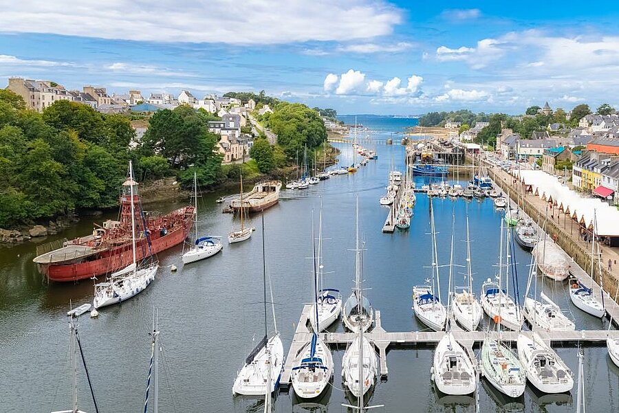 Sailboats and historic ships fill Douarnenez’s port museum, ready to be explored during a campsite stay in Brittany.