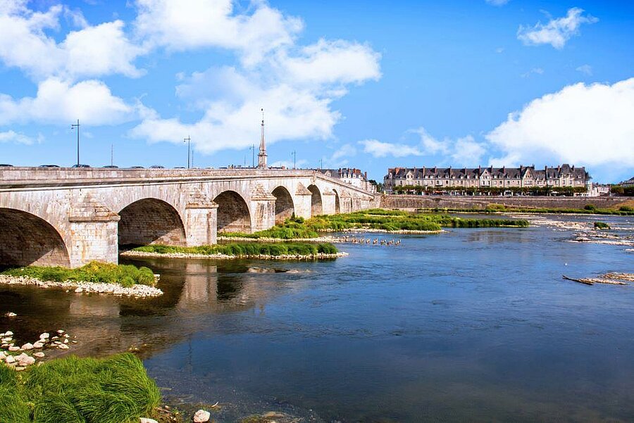 View of the Blois bridge crossing the Loire River, iconic heritage near campsites in the Loir-et-Cher region