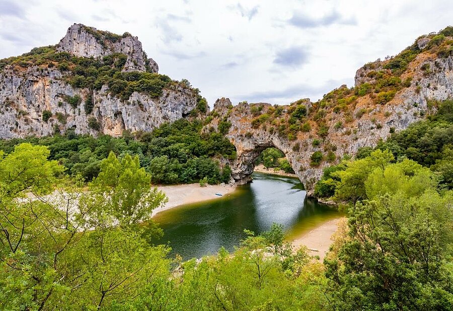 View of the Pont d’Arc and the Ardèche Gorges, an iconic natural landscape close to Salavas campsite.