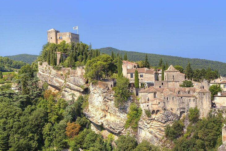 View of the Upper Town of Vaison-la-Romaine and the Count's Castle perched on a rocky outcrop.