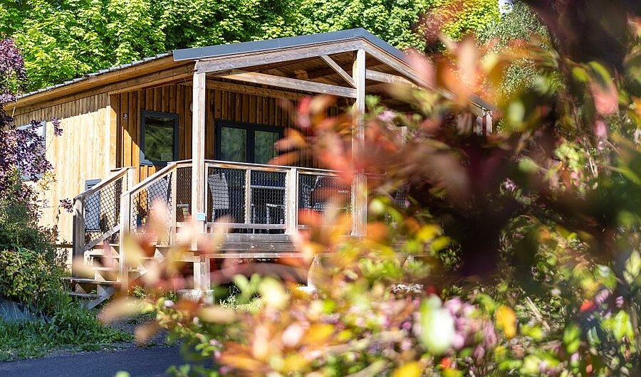 Modern mobile homes in a natural setting at La Marmotte campsite in La Bourboule, in the Puy-de-Dôme
