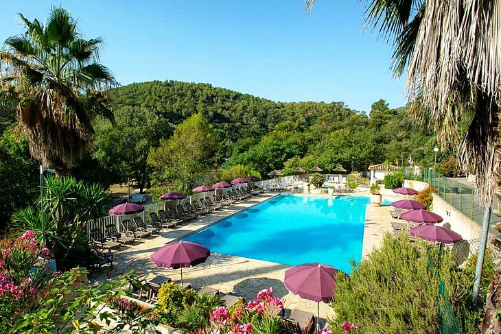 Outdoor Pool at the Heart of a Nature Campsite in La Colle-sur-Loup, surrounded by green hills, one of the best ways to relax after exploring what to do in La Colle-sur-Loup.