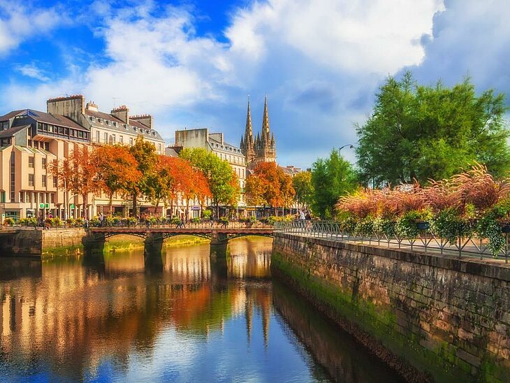 Autumn break in Quimper, Brittany Breton town crossed by a river and surrounded by trees in autumn colours.