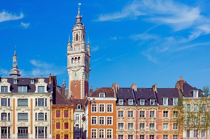 Colourful façades of the Grand Place and Lille’s belfry, a must-see stop on any weekend break in Hauts-de-France