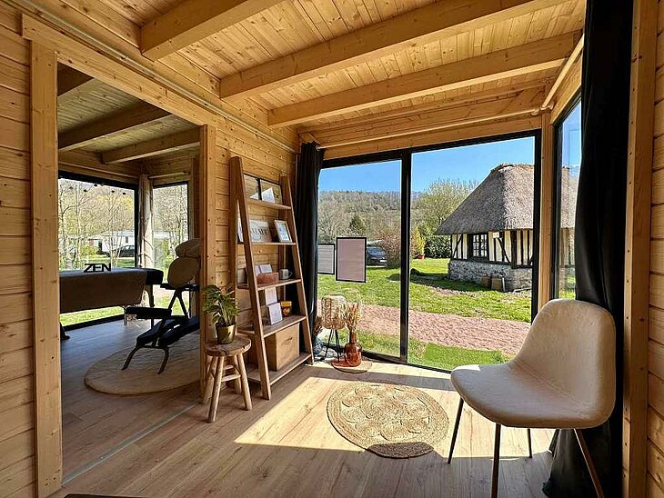 Interior view of the Maison Caléa, the wellness area at Domaine de la Catinière campsite, with sauna, jacuzzi, and massages for a relaxing family break in Fiquefleur-Équainville