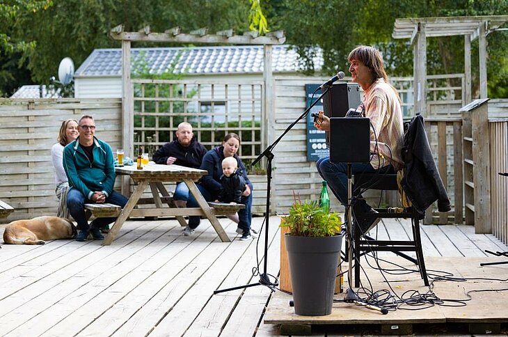 Open-air concert Open-air concert at Le Neptune campsite in Lanloup, a family-friendly gathering reflecting Breton culture and local heritage.