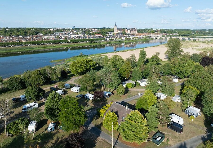 Aerial view of a nature campsite in Loiret, by the Loire River and facing Gien, perfect for family holidays.