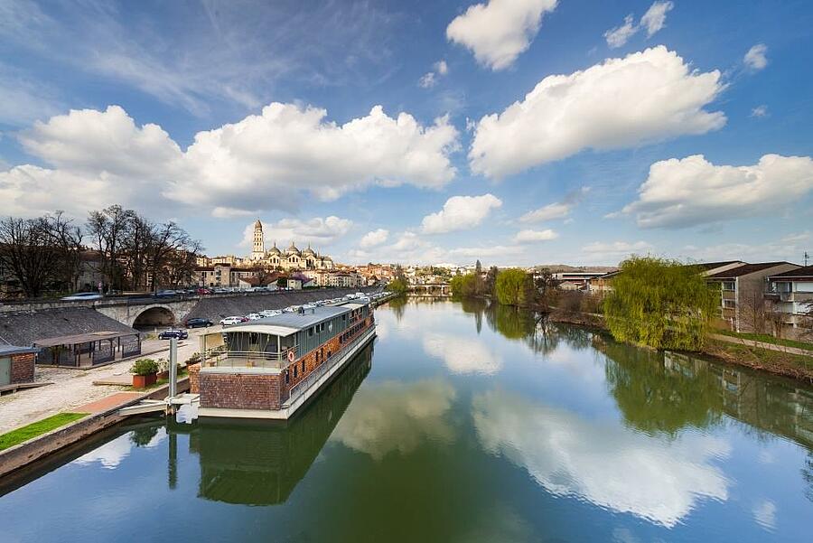 View of Périgueux and a peaceful river in Nouvelle-Aquitaine