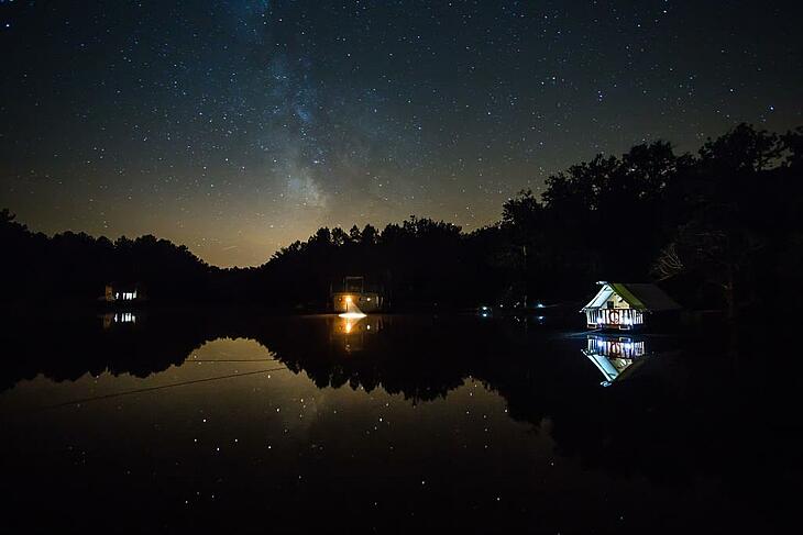 The enchanting atmosphere of winter camping by the lake