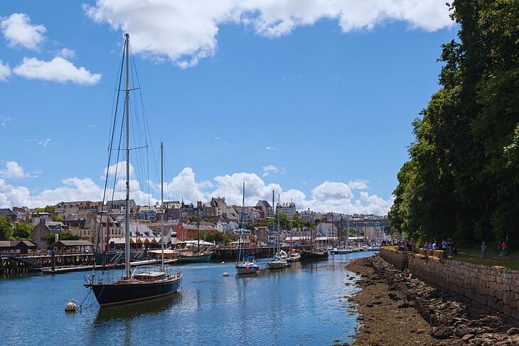 Harbour in the Bay of Douarnenez Harbour in the Bay of Douarnenez in Finistère with sailing boats and Breton houses, an iconic maritime landscape of Finistère Tourism.