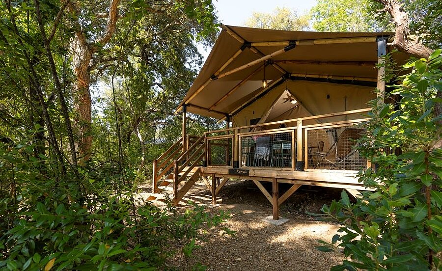Wooden and canvas lodge tent in a nature campsite near Porto-Vecchio, perfect for family holidays in South Corsica