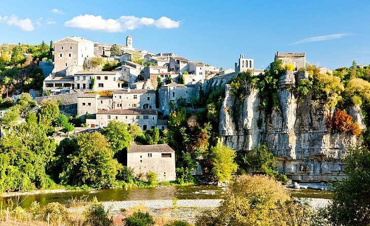 View of Balazuc in the Ardèche, a medieval stone village overlooking the river, perfect for exploring the region’s rich heritage.