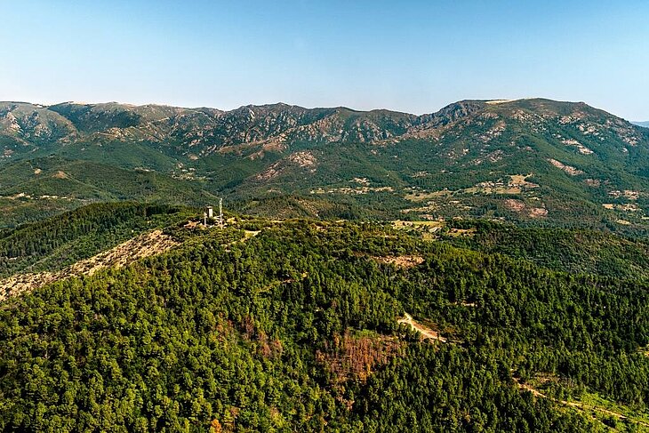 Panorama of the Ardèche mountains from a hiking trail, a wild landscape to explore around Joannas.