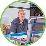 Happy camper after a stay at a family-friendly campsite with entertainment, spacious shaded pitches and spotless accommodation.