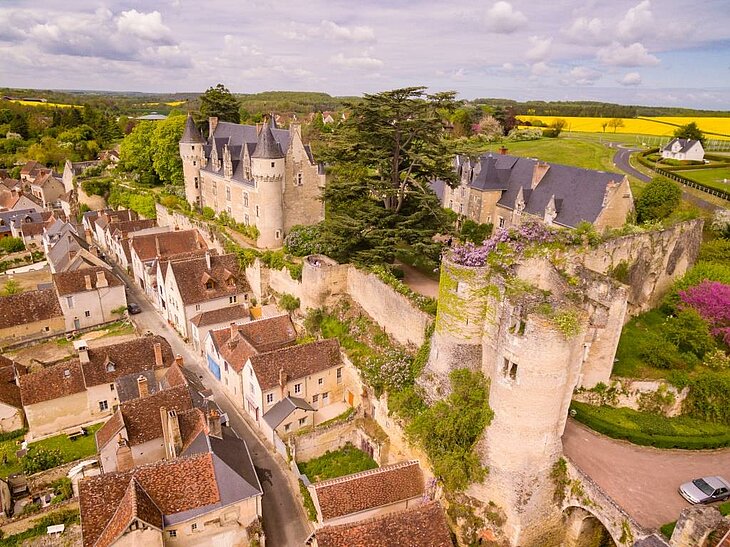 The Character Village of Montrésor Aerial view of Montrésor, with its castle and historic houses, a character village that showcases the charm of tourism in Centre-Val de Loire.