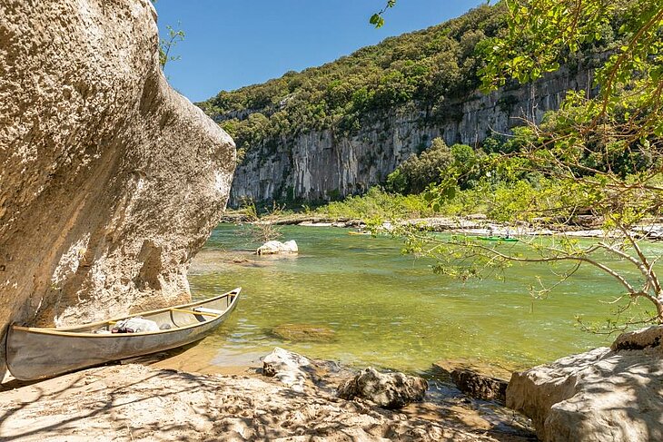 Canoe on the Ardèche River in the gorges, an essential outdoor activity for exploring spectacular unspoilt landscapes.